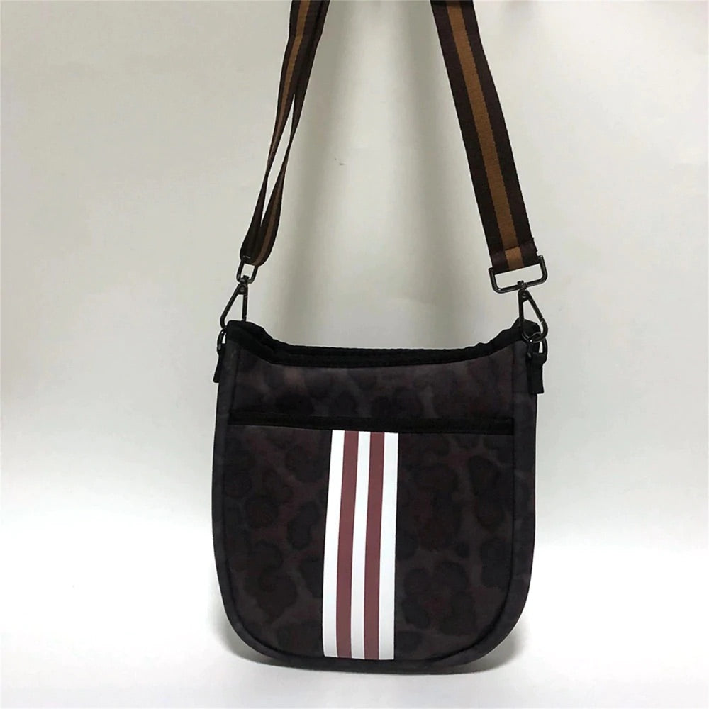 Subtle leopard print bag with red and white striped detail