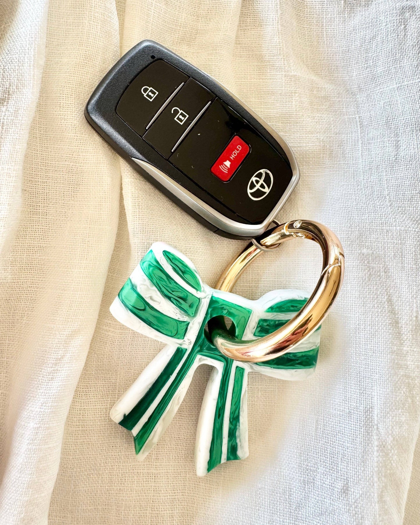 Stripey Bow Resin Keyrings: Green/White/ Silver