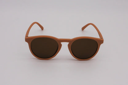 Orange and rust-coloured childrens sunglasses front view