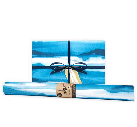 Water coloured design featuring tones of indigo and cyan printed on matt white wrapping paper