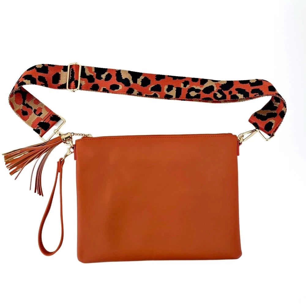 Orange bag with leopard print bag strap