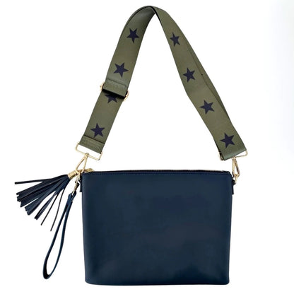 Navy blue mid town bag with leather tassel and star detailing on bag strap