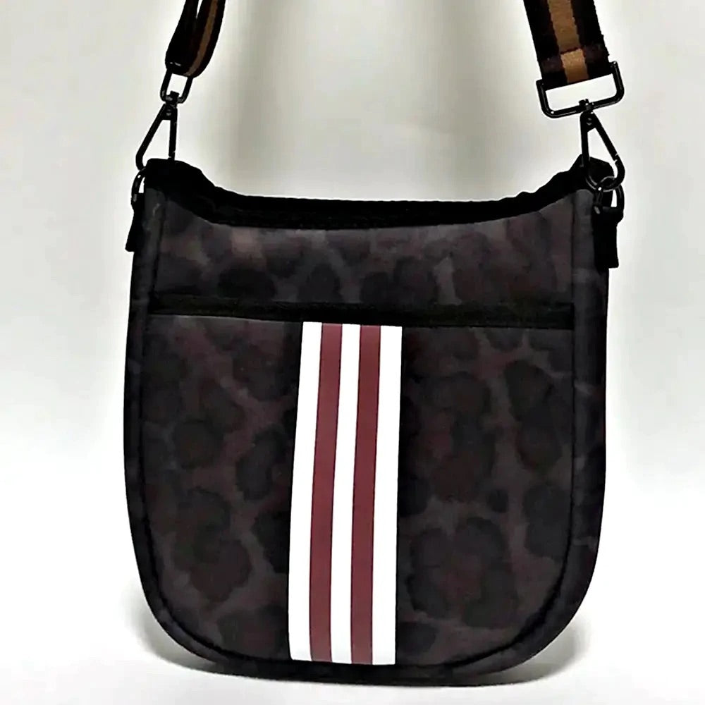 Subtle leopard print bag with red and white striped detail