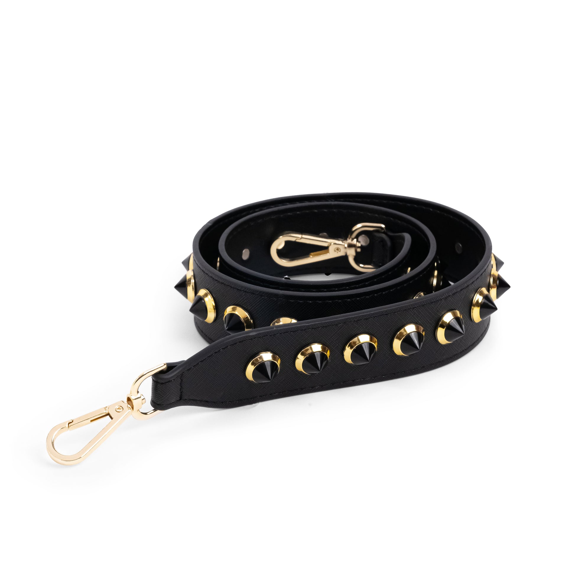Rolled up black bag strap with multicoloured studs