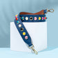 Blue bag strap with coloured studs 